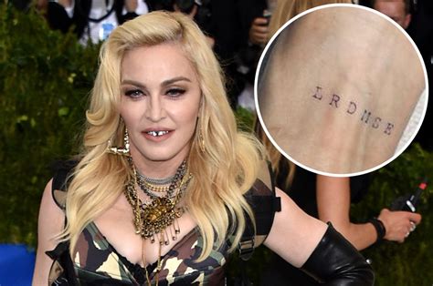 Madonna debuts her first tattoo at 62
