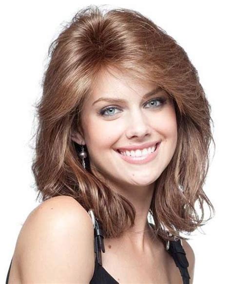 The modern take on the pageboy haircut frames the oval face beautifully. 15 Best of Long Haircuts For Oval Faces And Thick Hair