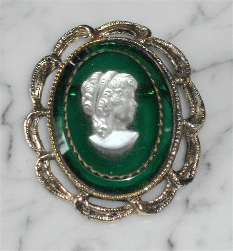 Vintage White Emerald Green Cameo Brooch In Gold Tone Metal