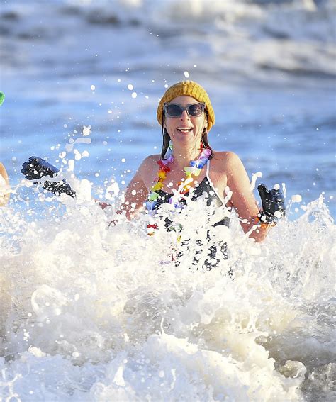 Swimmers Brave Freezing Cold Temperatures As They Hit The Water To