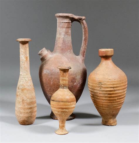 A Roman Pottery Unquentarium 825ins High A Small Pottery Vase With