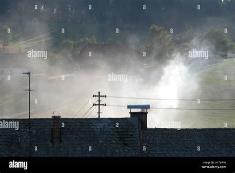 Smoking Chimney Of A House Stock Photo Alamy