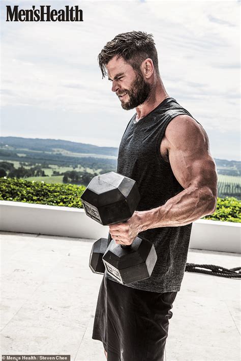 Chris Hemsworth Displays His Bulging Biceps In New Shoot Daily Mail