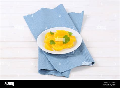Slices Of Peeled Orange Stock Photo Alamy