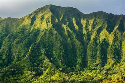 Early Morning Sun Shines On The Vertical Cliffs Of The Koolau Mountain