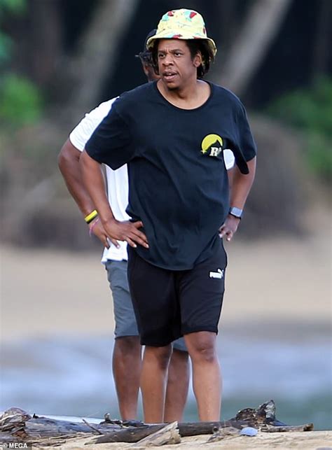 Jay Z Is Vacation Chic As He Dips His Feet Into The Sand During Beach