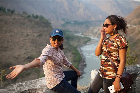 Young Woman And Teenage Girl Interacting At Outdoors By Stocksy Contributor Dream Lover