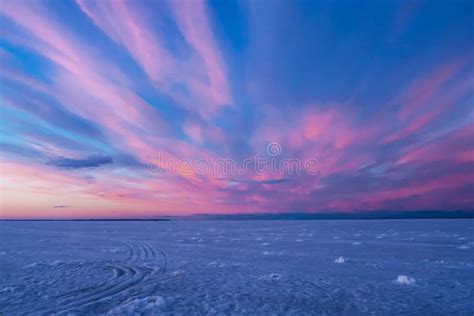 Purple Blue Sunset Or Sunrise In Winter Over The River Stock Photo