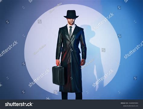 101229 Man In Black Coat Images Stock Photos And Vectors Shutterstock
