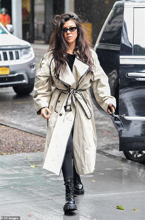 Kourtney Kardashian Braves Rainy Weather With Addison Rae In New York Combat Boot Outfit
