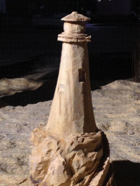 This Is A Cool Lighthouse Carved From Wood At A Fair In New England
