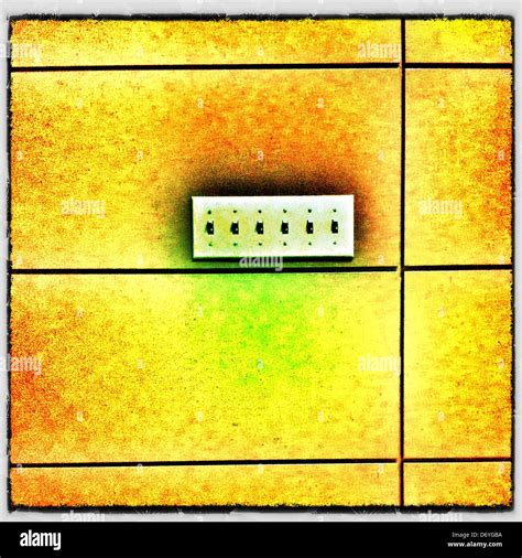 Row Of Light Switches In Yellow Wall Stock Photo Alamy