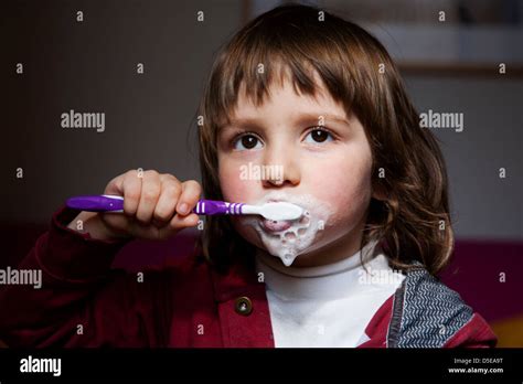 Four Year Old Brushing His Teeth Stock Photo Alamy