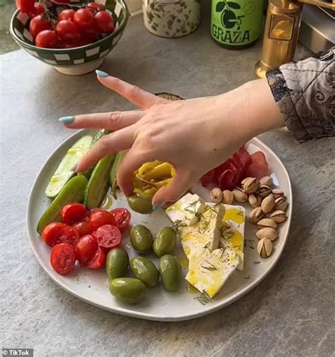 rise of the girl dinner tiktok trend sees women share snack plates they enjoy eating as a meal