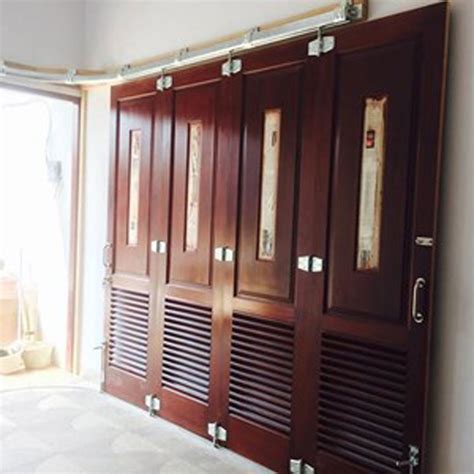 model pintu garasi minimalis kayu besi beserta harga