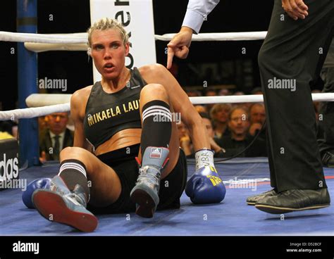 Mikaela Laurens Sits On The Floor After Her Defeat In Round 7 During A