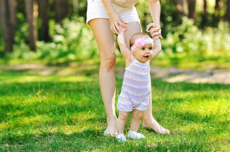 Mother Teaching Baby To Walk Stock Photo Image Of Parent Preschool