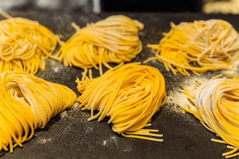 Premium Photo Homemade Piles Of Fresh Egg Spaghetti Pasta