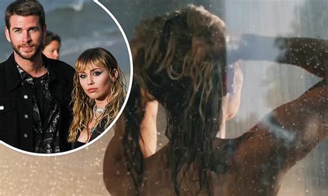 miley cyrus sings revenge song flowers naked in the shower in eye popping video