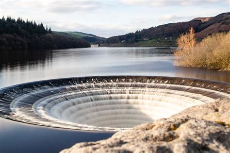 The white peak area of the peak district is named after the limestone plateau landscape of the 'derbyshire dome' anticline. Overflow Drain At Ladybower Reservoir. Stock Photo - Image ...