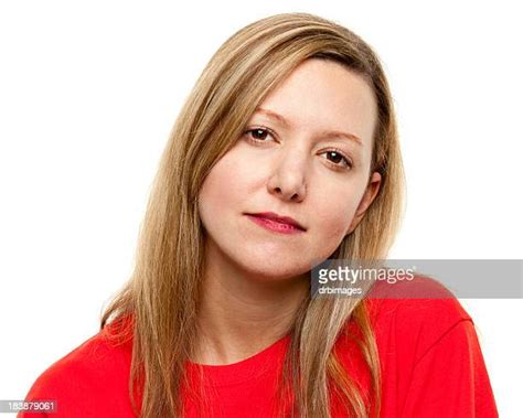 Serious Woman In Red T Shirt Photos And Premium High Res Pictures