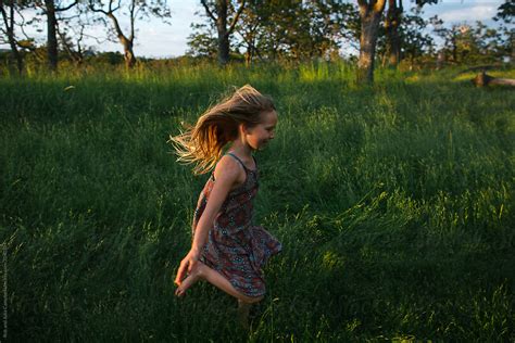 Girl Outside In Nature By Rob And Julia Campbell Stocksy United
