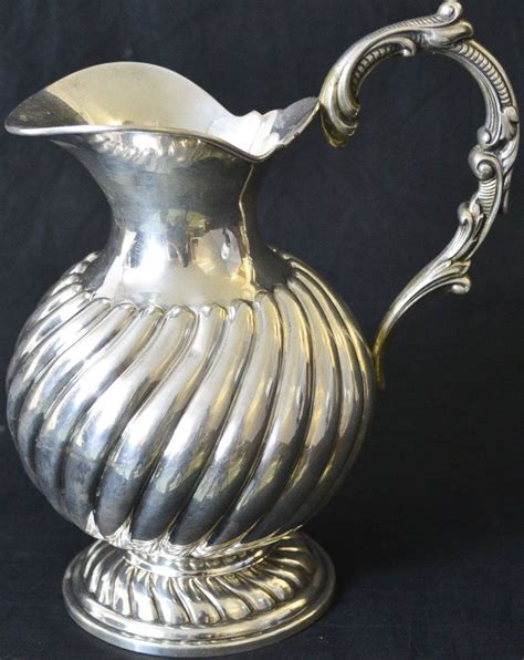 Antique Sterling Silver Pitcher With Baroque Handle