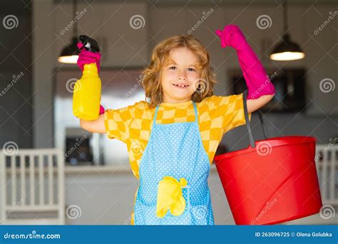 Child Use Duster And Gloves For Cleaning Funny Child Mopping House