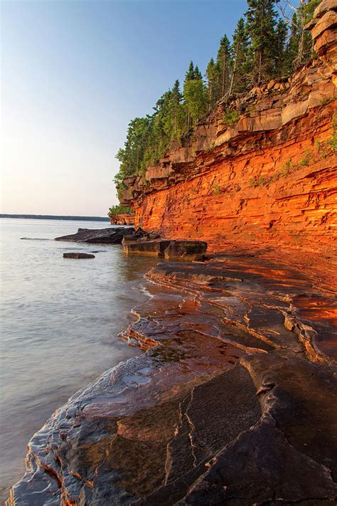 Layered Sandstone Cliffs And Sea Caves Photograph By Chuck Haney