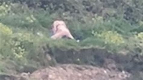 Amorous Couple Caught Having Sex On Cliff In View Of Restaurant Full Of