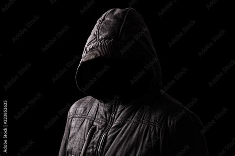 Scary And Creepy Man Hiding In The Shadows With The Face And Identity