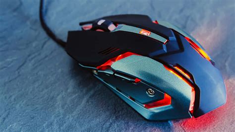 Download Enhance Your Gaming Ability With Quality Gaming Mice Wallpaper