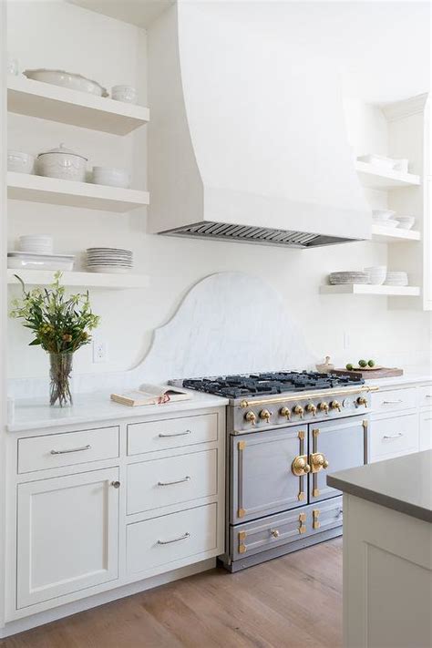 Be sure the brackets are installed so that the shelves will be level. 10 Lovely Kitchens With Open Shelving