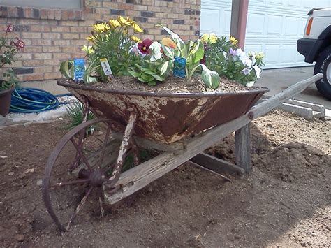Antique Wheelbarrow Flower Bed Gardening And Landscaping Pinterest