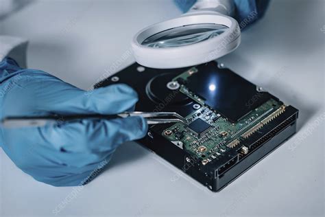 Forensics Expert Examining Crime Scene Evidence Stock Image F024