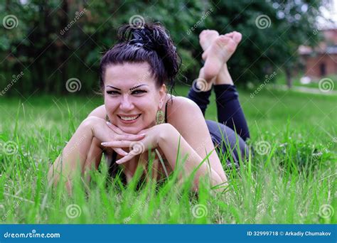 Brunette Smiling On A Grass Stock Photo Image Of Grass Copy 32999718