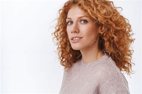 Free Photo Close Up Feminine Gorgeous Redhead Curly Woman In Beige Blouse Standing Half Turned