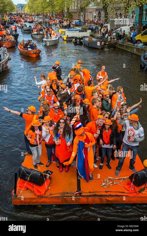 boat parade on queen s day prinsengracht canal amsterdam province of north holland the