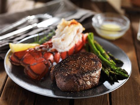 You would think during these times the salad would automatically accompany a meal! steak and lobster surf & turf gourmet dinner with asparagus - Double JJ Resort