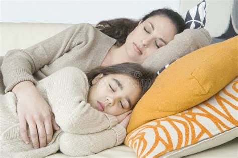 Mum And Daughter Sleeping On Couch Stock Image Image