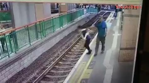 Man Pushes Woman Onto Hong Kong Rail Tracks Casually Walks Away Youtube