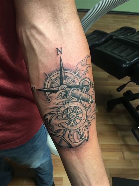 3d tattoo with combination of compass, rose and candle. Ship wheel, compass, anchor | Tattoos for guys, Hand ...