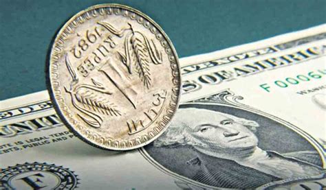Rupee Gains 13 Paise To 8257 Against Us Dollar Telangana Today