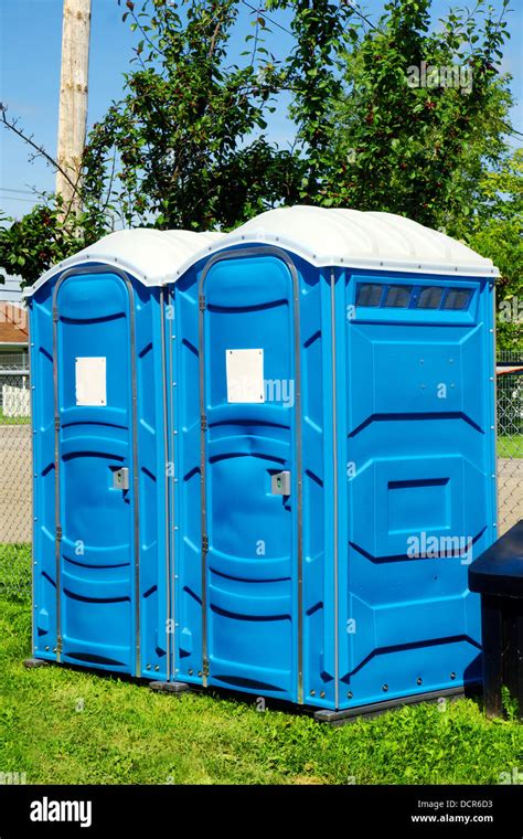Portable Toilets On Grass Stock Photo Alamy