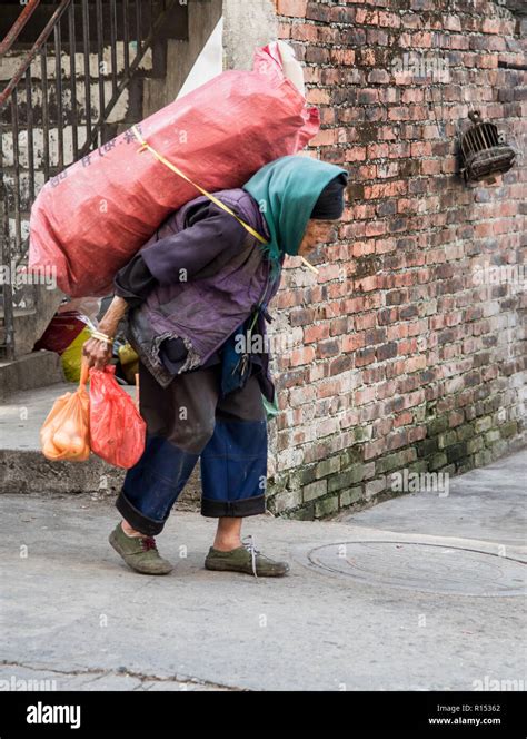 Old Woman Carrying Heavy Load High Resolution Stock Photography And