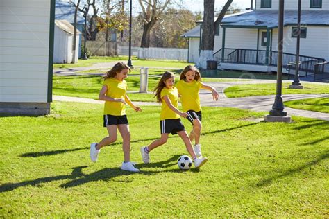Friend Girls Teens Playing Football Soccer In A Park Turf Grass Photo