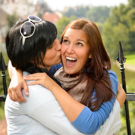 Mother Kissing Her Daughter Happy Embrace Outdoors Stock Image Image Of Fence Casual 26697895
