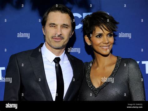Halle Berry A Cast Member In The Television Series Extant Poses With Her Husband Olivier