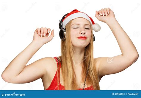 Young Woman In Santa Claus Hat And Headphones Take Pleasure From Stock Image Image Of