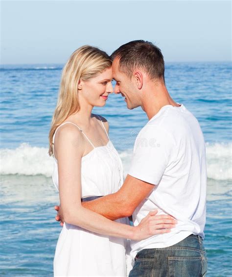 Loving Couple Cuddling At The Beach Stock Image Image 12445411